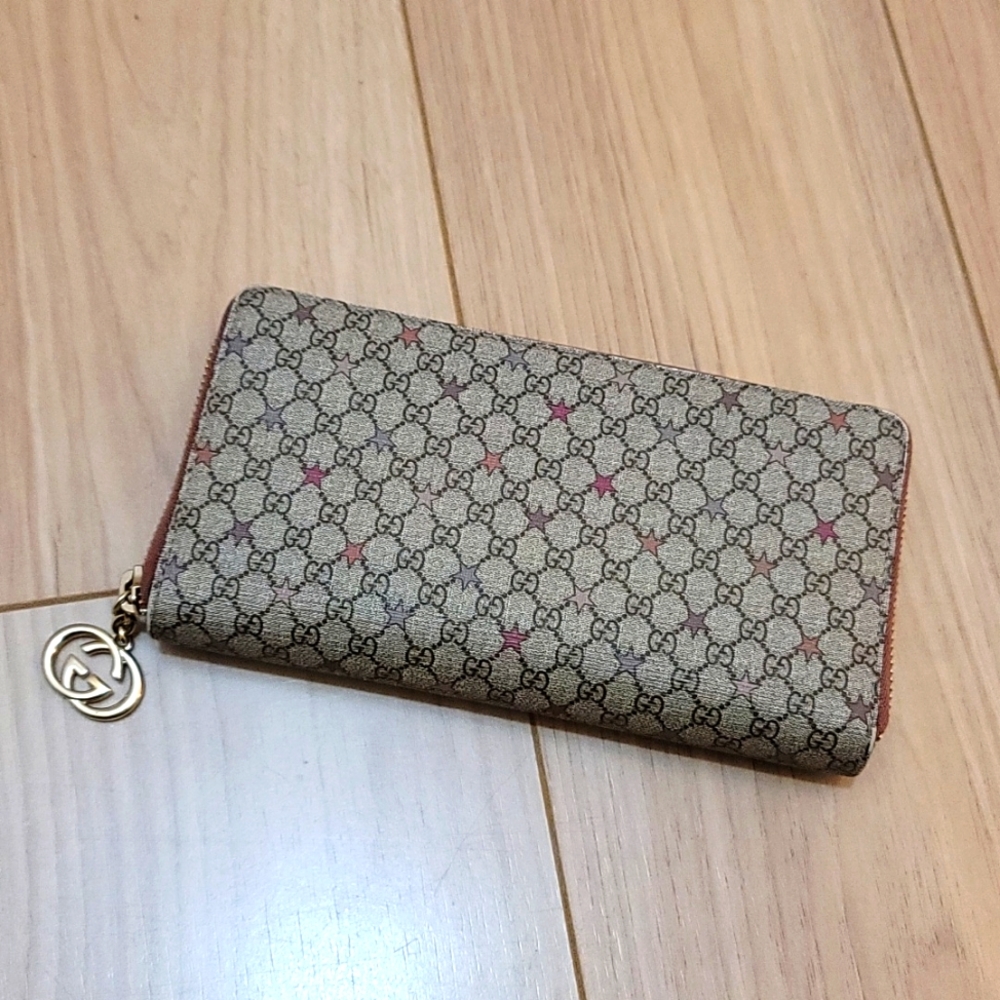 Gucci Beige/Brown Monogram Zip Wallet with Pink Star Accents